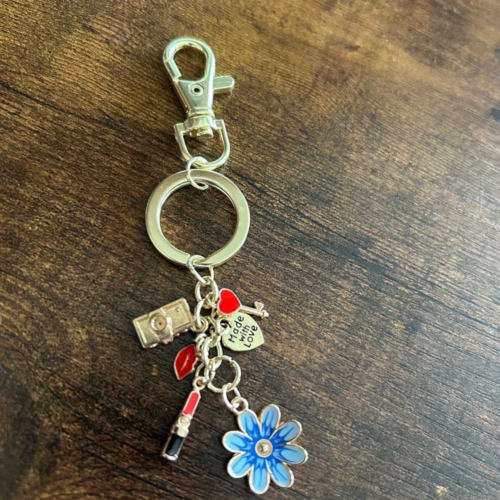 Charming Keychain with Blue Flower and Red Accents